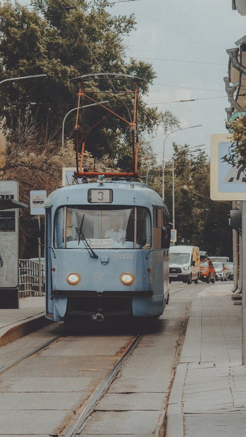 Blue Tram on Road