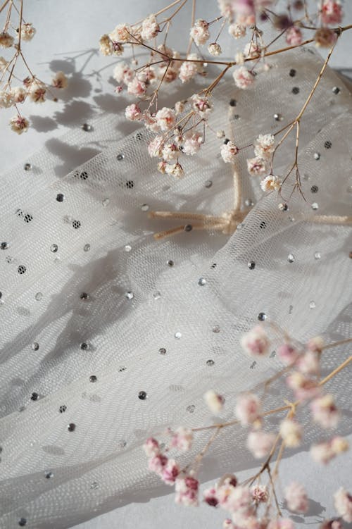 Flowers and Fabric on a Table