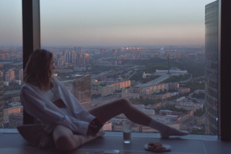 Glass Window With View Of City Buildings