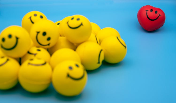 Yellow Smiley Emoticon On Blue Surface