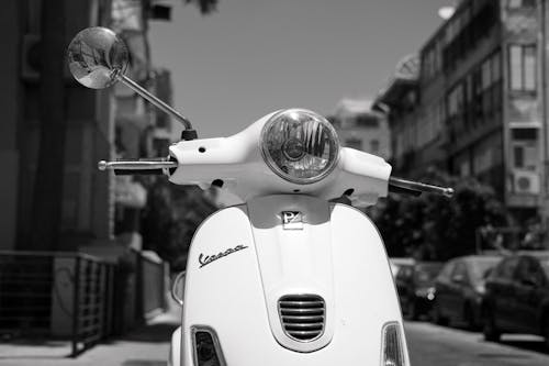 Grayscale Photo of Motor Scooter