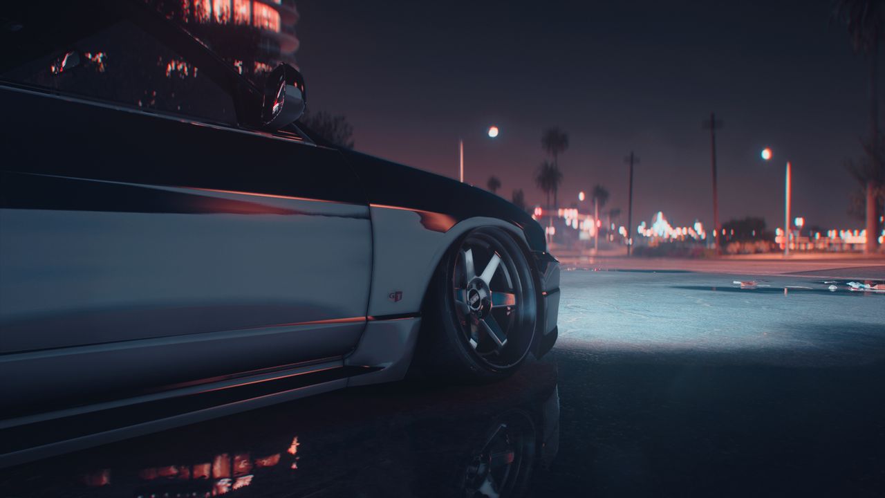 a stylish sports car captured at night in an urban environment with ci