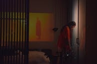 Restless Man leaning his Head against the Door