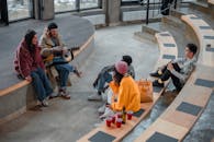 Friends Sitting in Amphitheatre