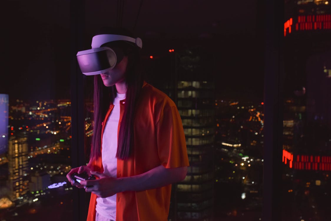 Gamer using Virtual Reality Goggles · Free Stock Photo