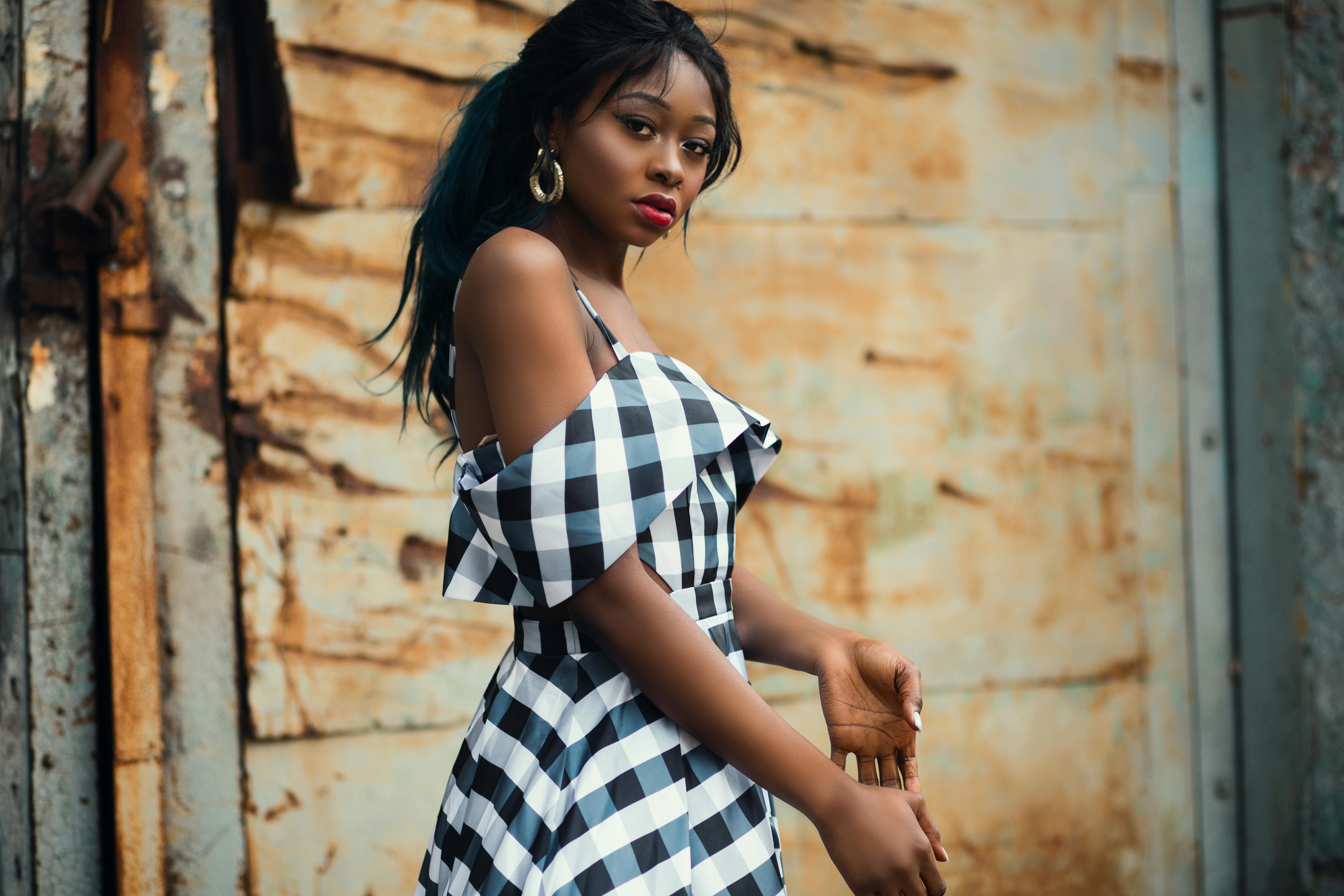 Black and white clearance off the shoulder dress