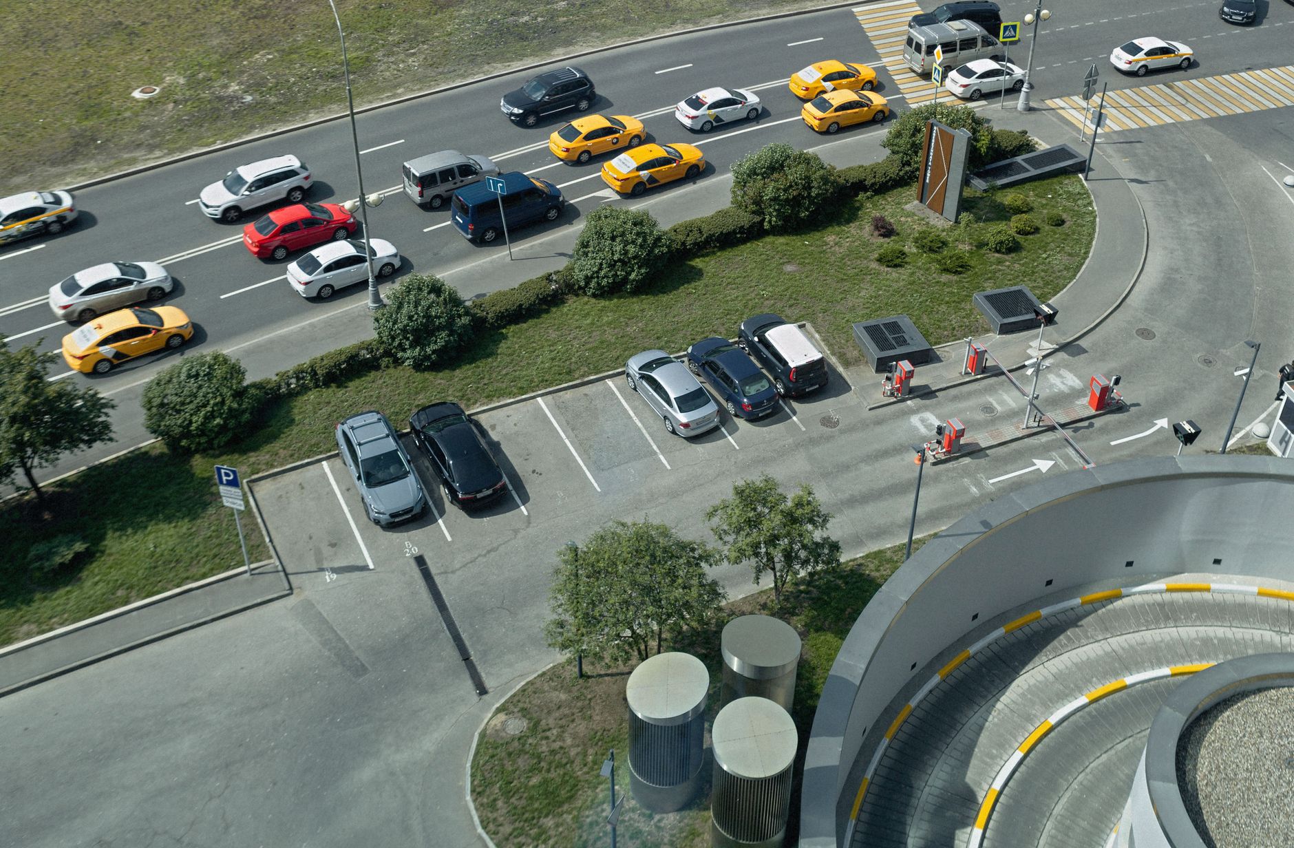 Aerial shot of traffic and parking area in Moscow, showcasing urban life and transportation.