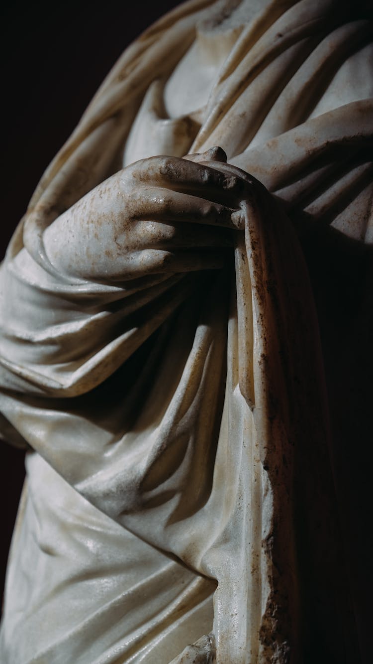 A Statue In A Cloak