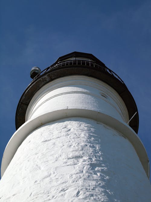 Low Angle Shot of White Light House