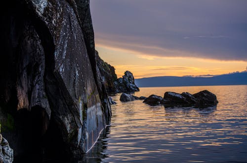 Scenic Photo of Cliffside During Dusk 