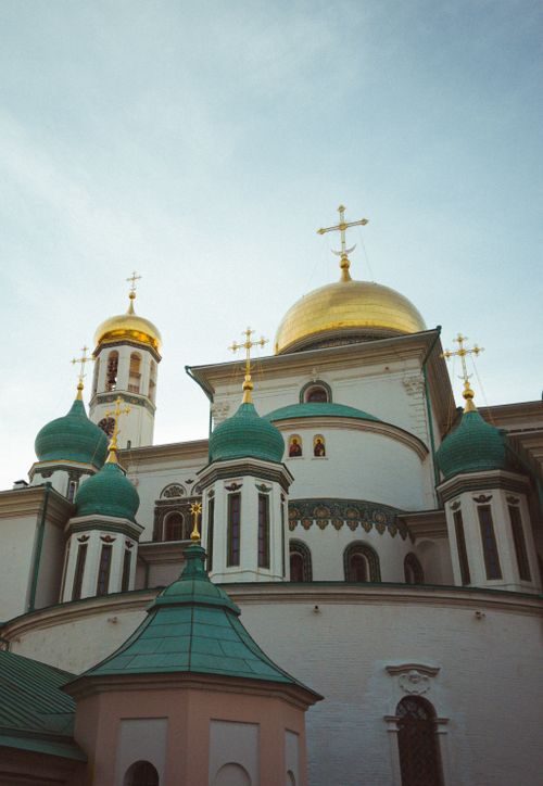 Free Low angle view of the New Jerusalem Monastery's exquisite domes under a clear sky. Stock Photo