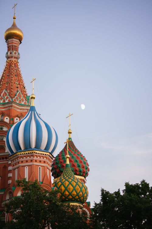 Free Classic view of St. Basil's Cathedral domes against a clear sky in Moscow, Russia. Stock Photo