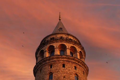 A Close-Up Photography of Galata Tower During Golden Hour