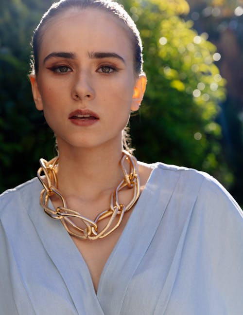 Free Alluring Woman with Gold Accessory on her Neck Stock Photo