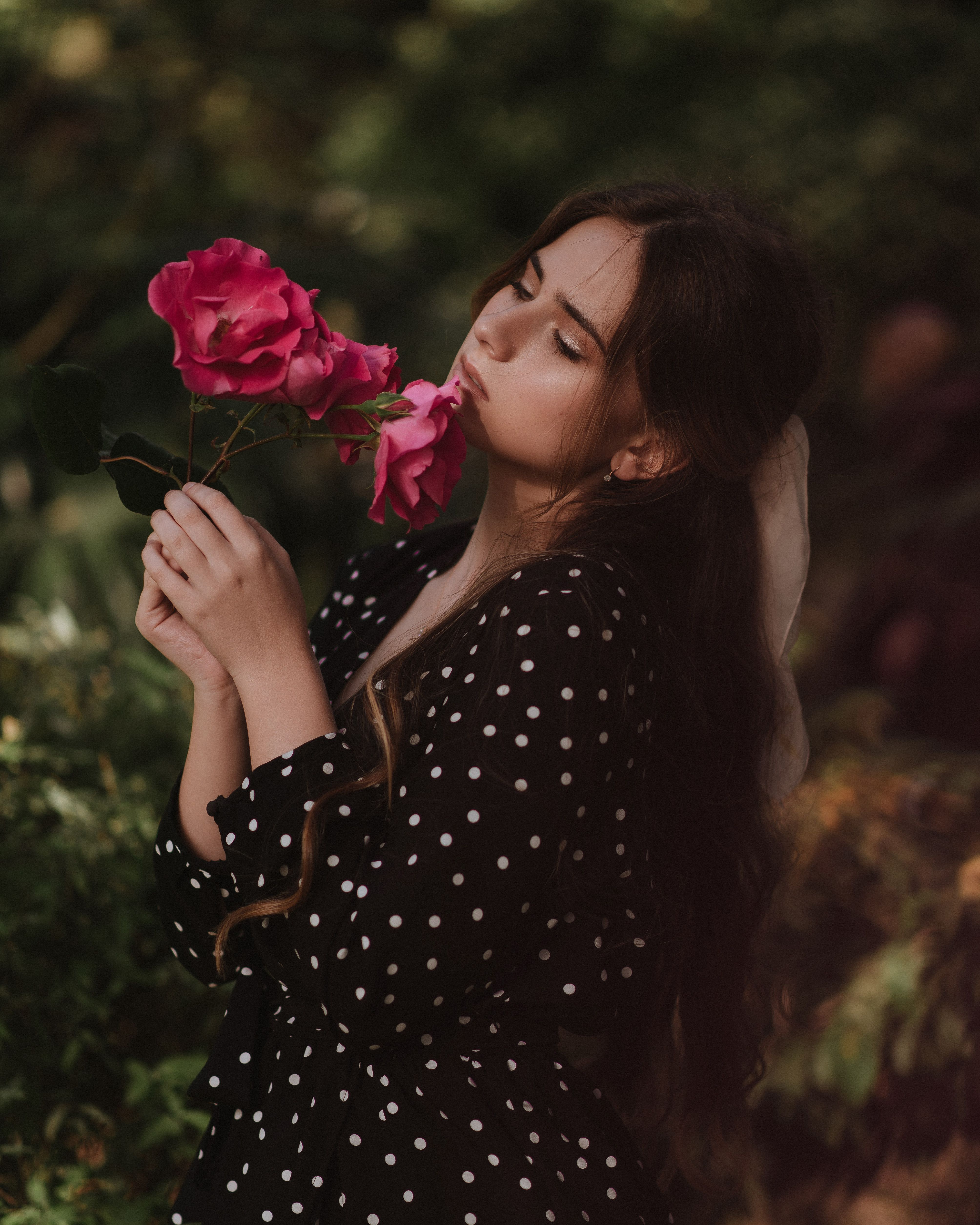 Woman in Black Dress Holding a Bicycle · Free Stock Photo