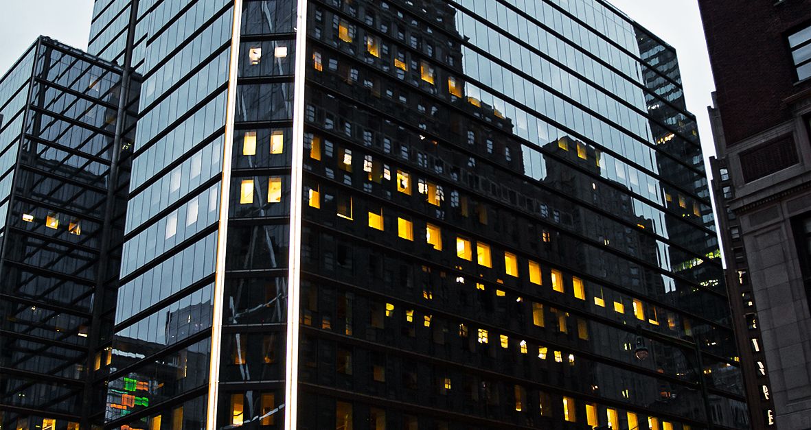 Black and Silver Building Under Blue Sky · Free Stock Photo