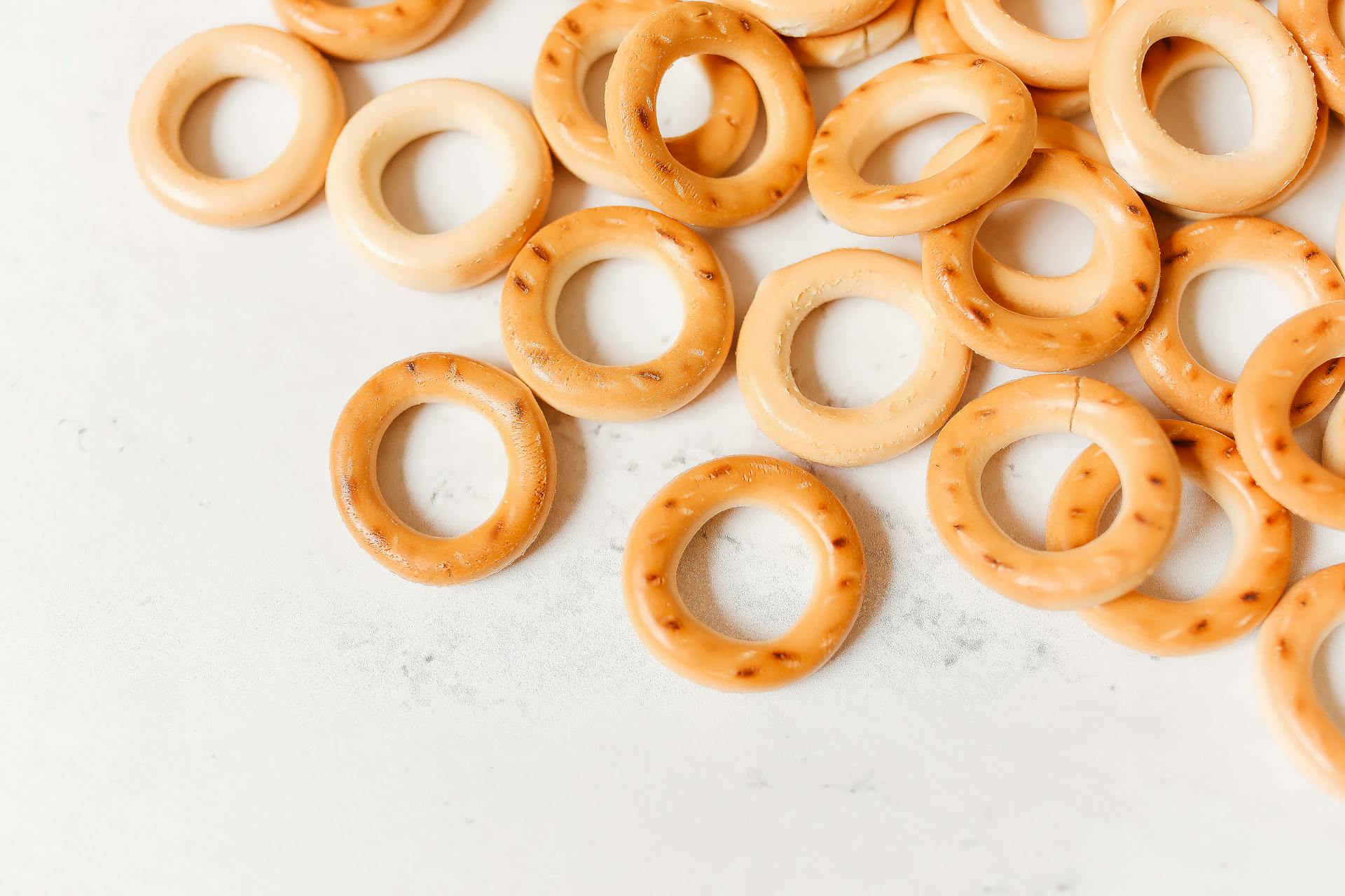 Rounded Baked Goods on a White Surface