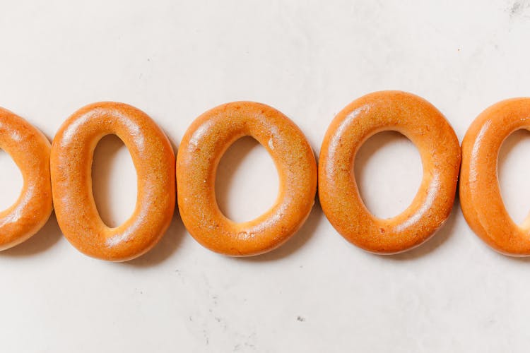 A Bagels On A White Surface