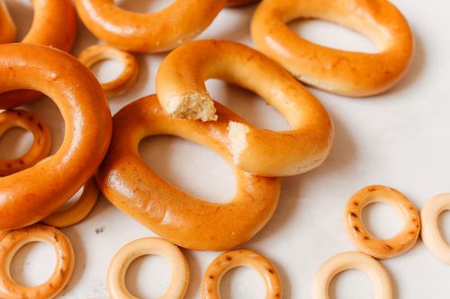 Free Delicious baranki pastries arranged on a white surface, showcasing a close-up view and inviting texture. Stock Photo