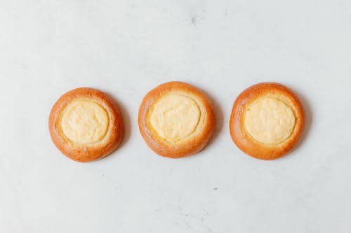 Free Three Yummy Breads on the Table Stock Photo