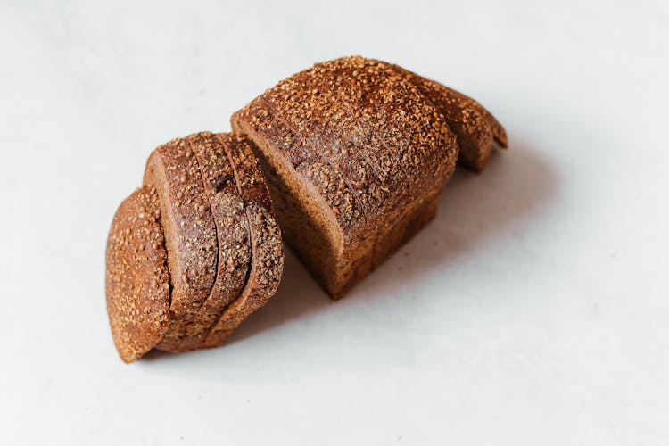 Brown Bread On White Surface