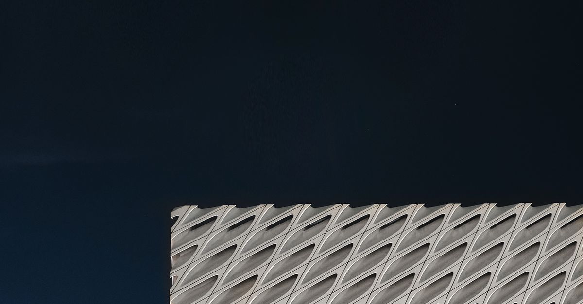 Modern Geometric Building Design Against Blue Sky Free Stock Photo Modern Geometric Building Design Against Blue Sky Free Stock Photo