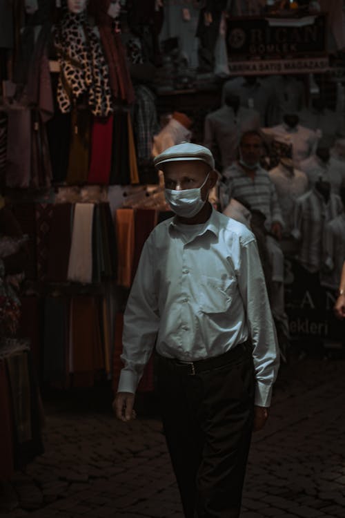 Free stock photo of dark, hat, man