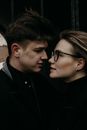 Man and Woman in Black Clothes Looking at Each Other