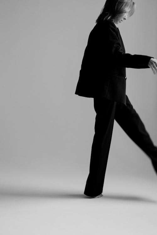 Grayscale Photo of a Woman Wearing a Suit · Free Stock Photo