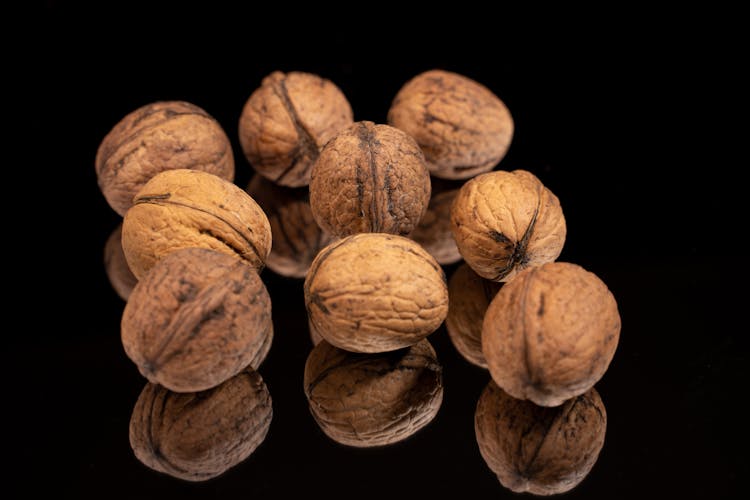 Walnuts On Black Background