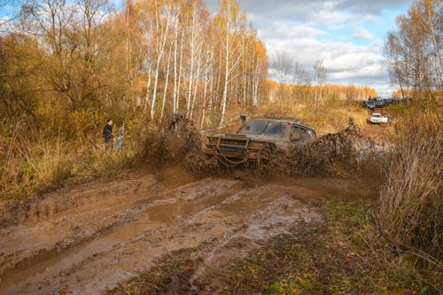 An Off-Road Vehicle Driving on Mud 