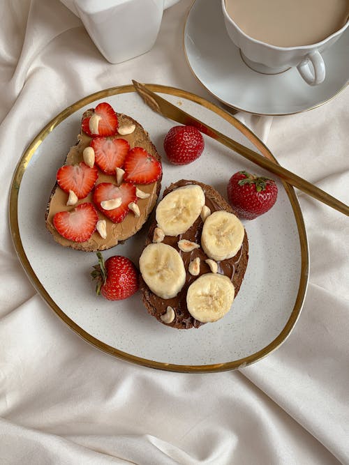 Free Pancakes with Fruits Served for Breakfast  Stock Photo