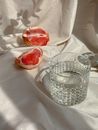 Clear Glass with Water on White Textile
