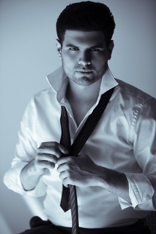 Sexy Man in Formal Wear Posing in Studio