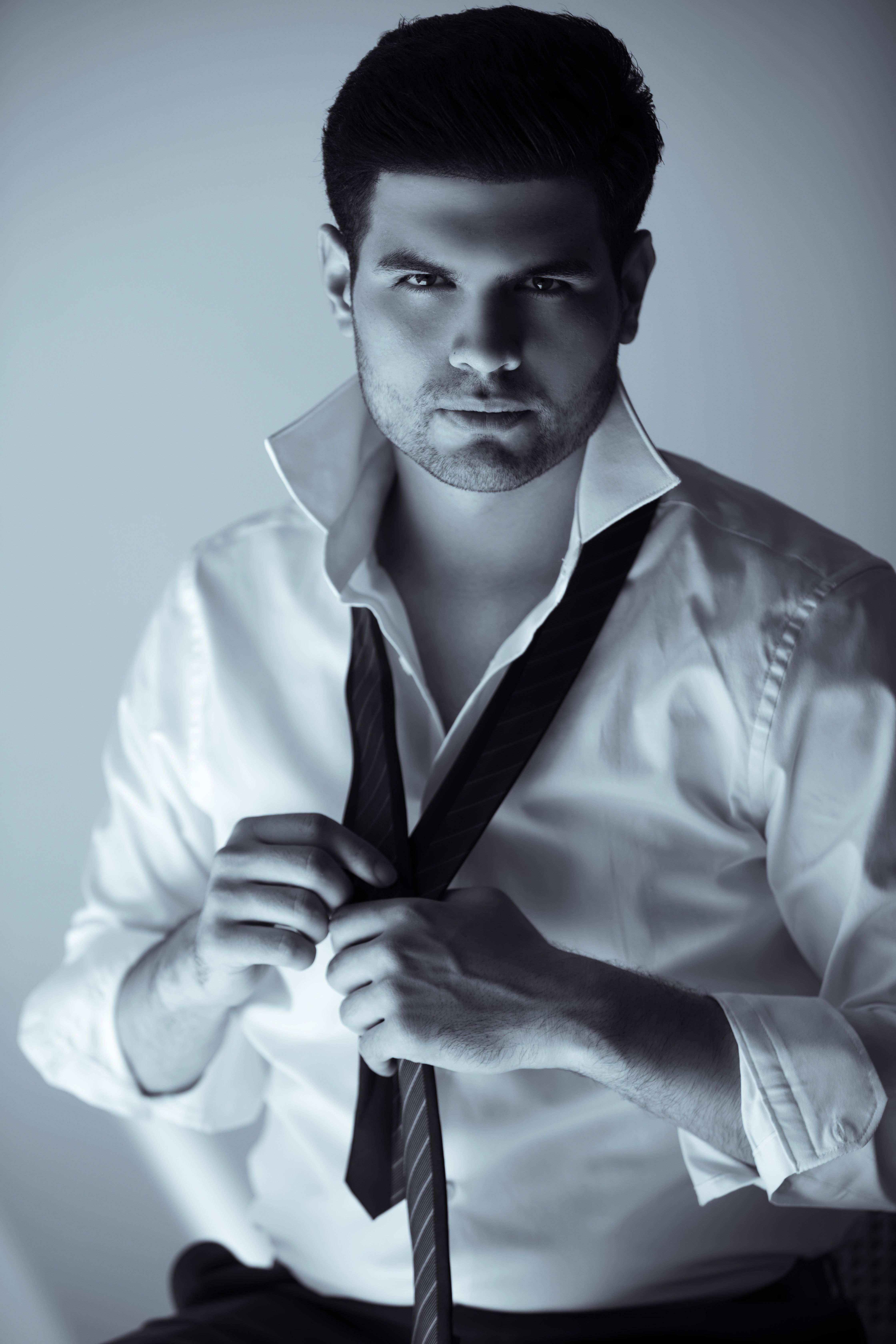 Man Posing in Suit in Black and White · Free Stock Photo