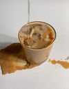 Ice Cubes with Brown Liquid in Clear Drinking Glass