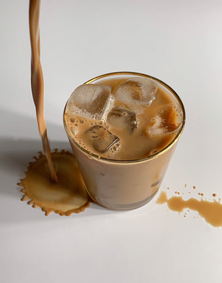 Pouring Coffee On White Surface