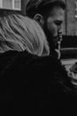 A Woman Leaning on a Man's Shoulder