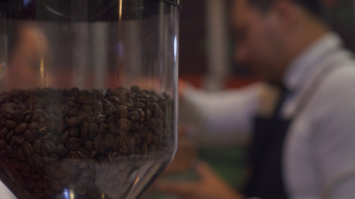 Semaglutide injection pen held in a gloved hand