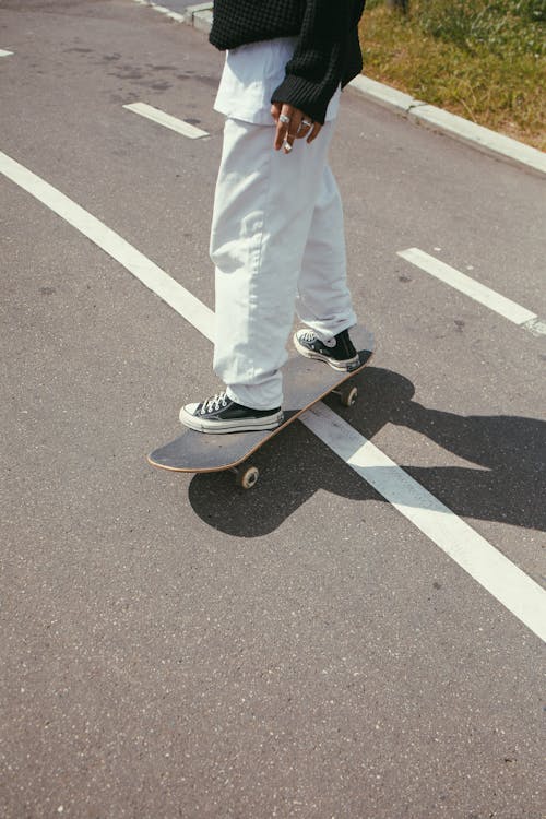 Free A Person Riding Skateboard Stock Photo