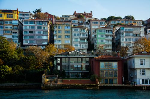 Free Colorful waterfront buildings with classic architecture in urban setting. Stock Photo