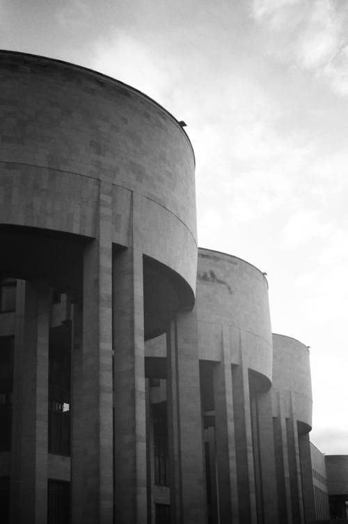 Grayscale Photo of Concrete Building