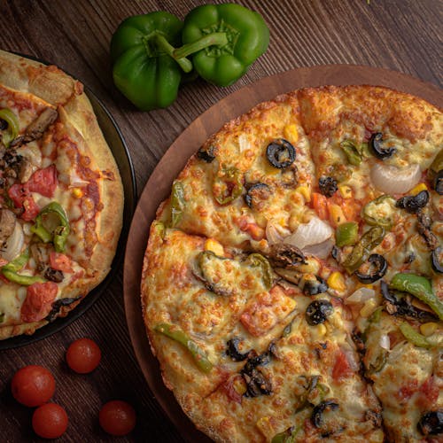 Close-Up Shot of Yummy PIzzas