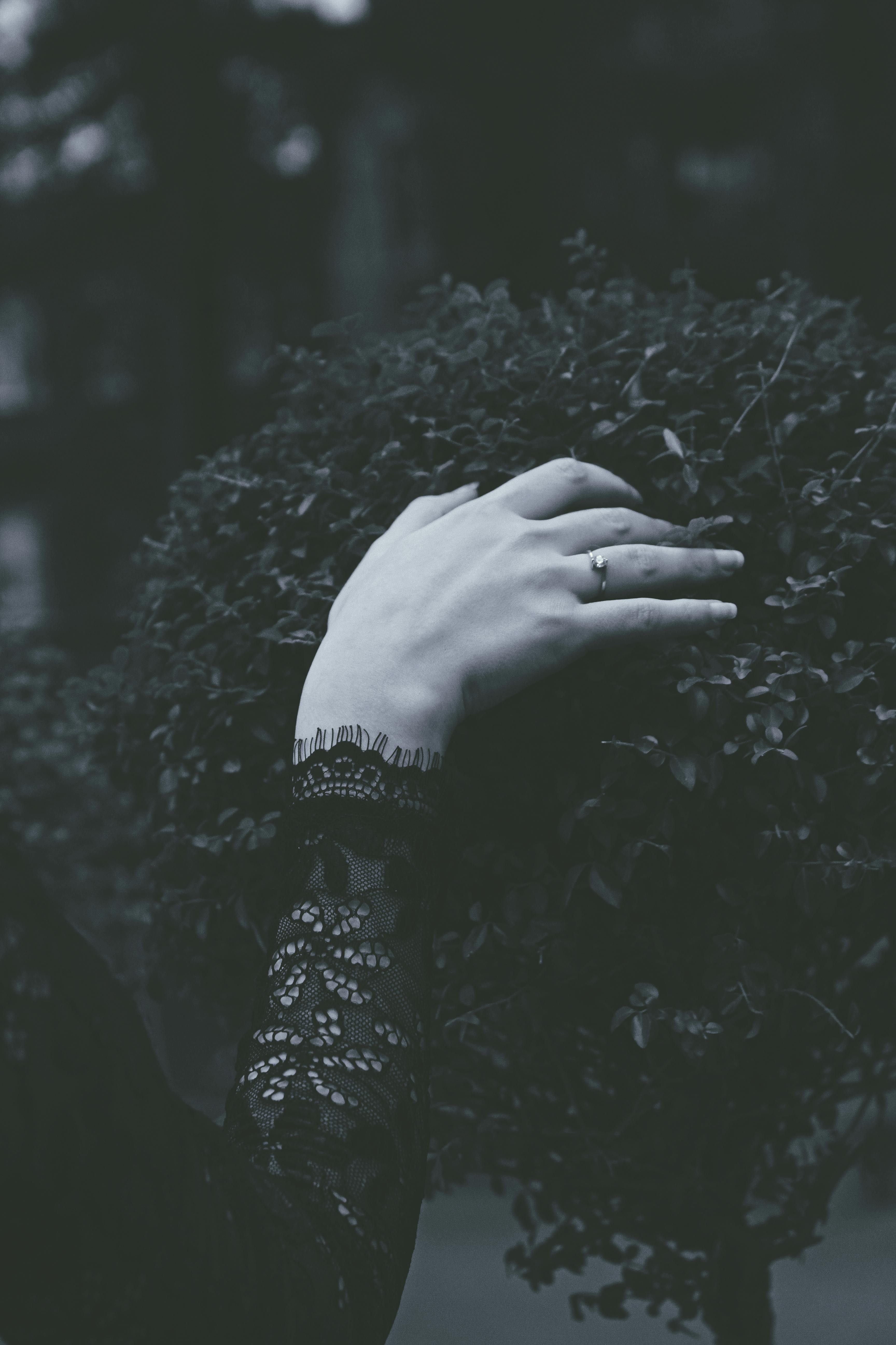 Grayscale Photography Of A Person Wearing Black Long-sleeved Top 