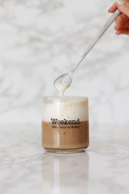 Free Coffee with milk and foam Stock Photo