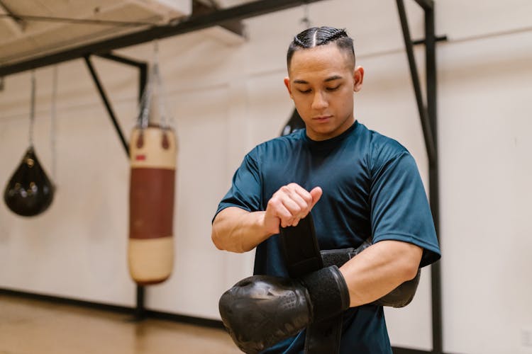 A Man Wearing A Boxing Glove