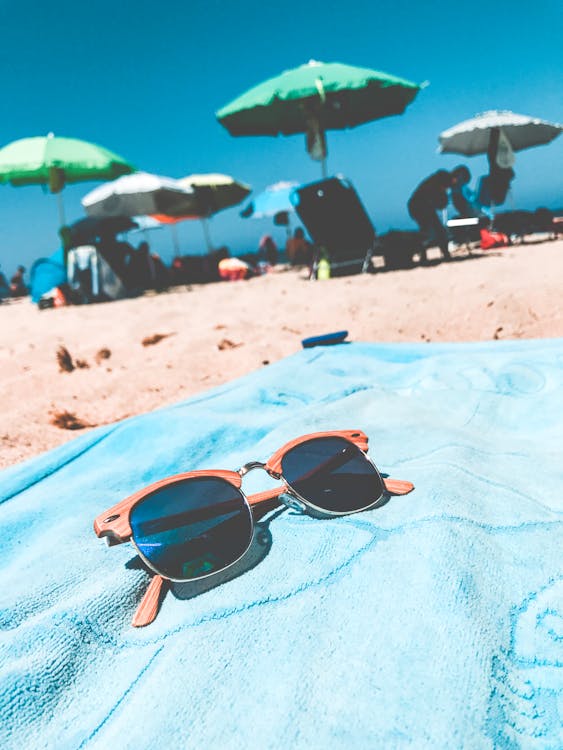 Brown Clubmaster Sunglasses on Blue Towel