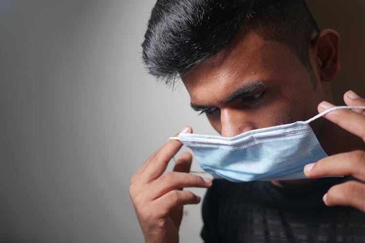 A Man Wearing Surgical Face Mask