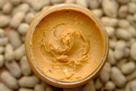 Brown Powder in Brown Round Container
