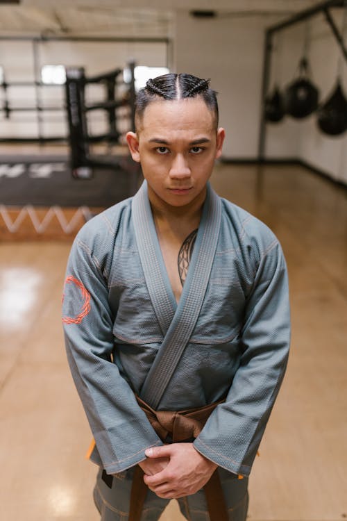 Man in a Gray Karate Uniform